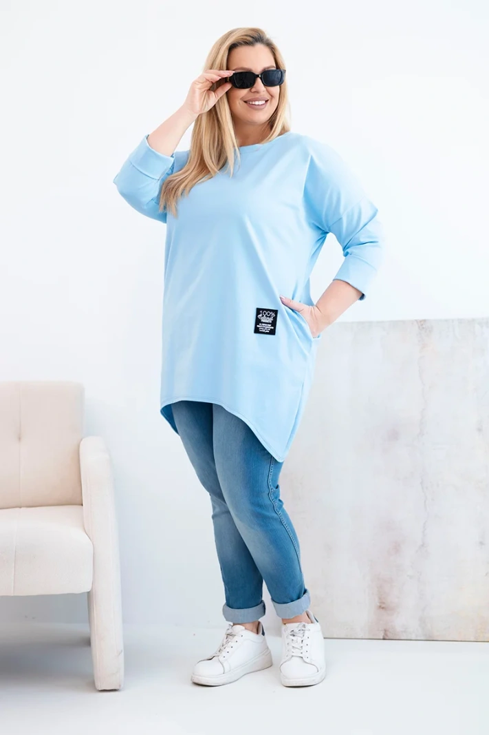 Bluzka damska Plus Size z dłuższym tyłem i długim rękawem niebieska