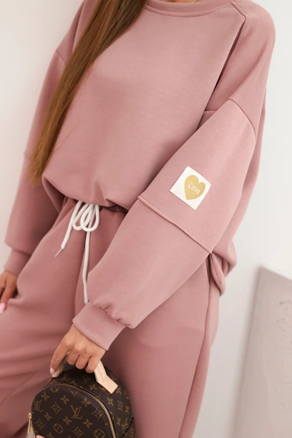 Ladies' butter set with a loose sweatshirt and pants with the inscription LOVE khaki