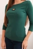 Women's ribbed blouse with 3/4 sleeves and decorative patch dark green