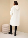 A coat women's made of polyester with a hood and buttons ecru
