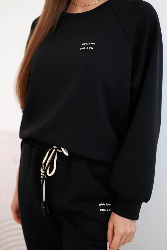 Damen-Set aus Viskose mit Pullover und Hose butterfarben schwarz