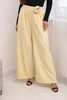 Women's elegant pants with wide legs and decorative flower yellow