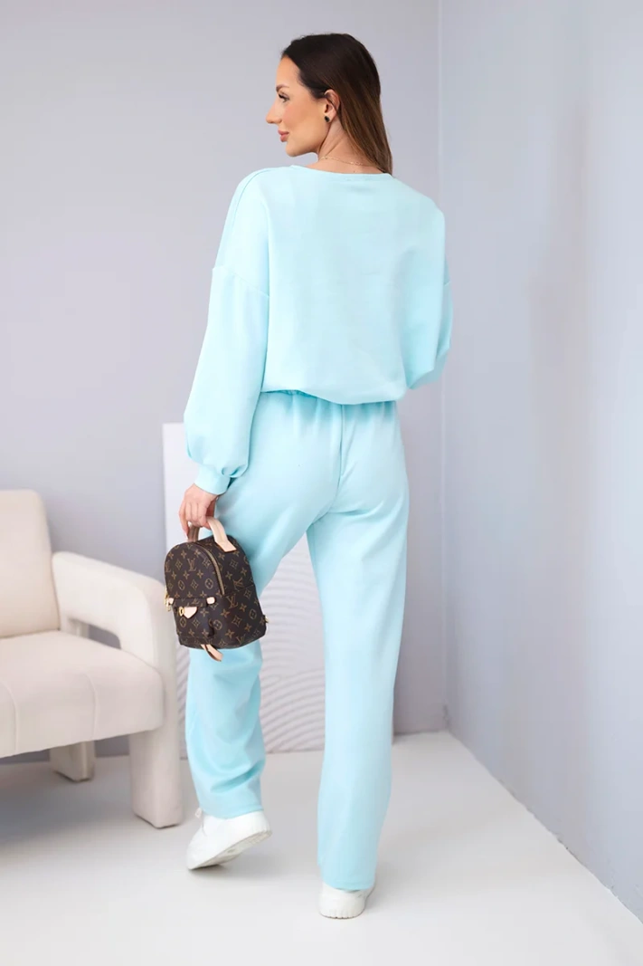 Women's set butter sweatshirt with a brooch and straight-leg pants lemon