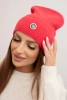 Women's soft hat made of fluffy knit with a decorative plate raspberry