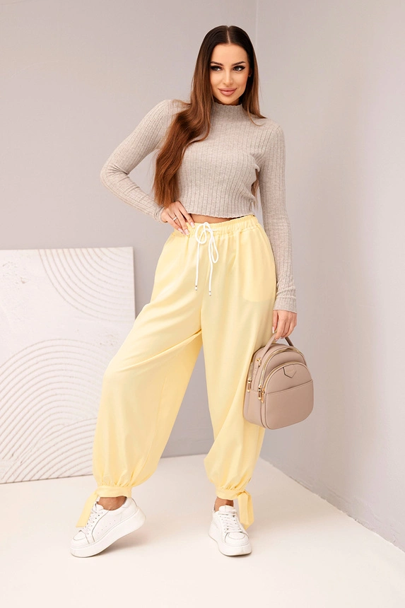 Women’s wide-leg trousers with ties at the bottom yellow