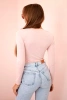Women's bodysuit blouse with ruffles and decorative buckle powder pink