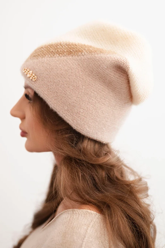 Women's winter hat made of fluffy knit with a decorative appliqué ecru + beige