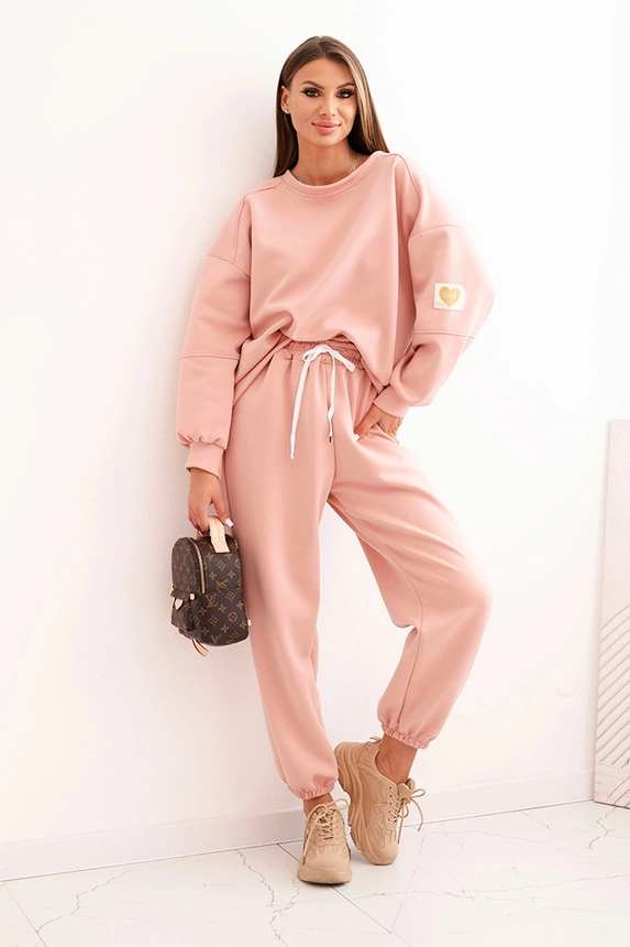 Women's set with a loose sweatshirt and pants with the word LOVE dark powder pink