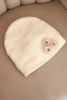 Women's hat with decorative fur flowers elegant beige