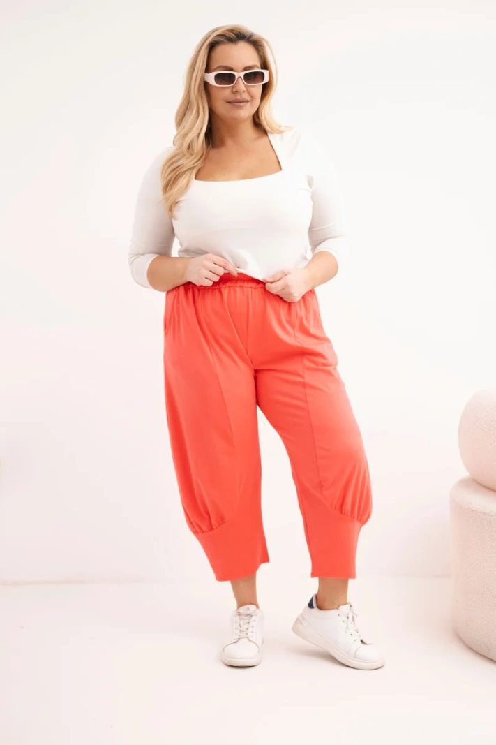 Spodnie damskie Plus Size z obniżonym krokiem i gumką w pasie koralowe