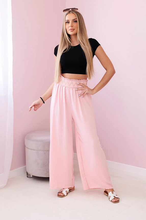 Trousers with a wide elastic waistband powder pink