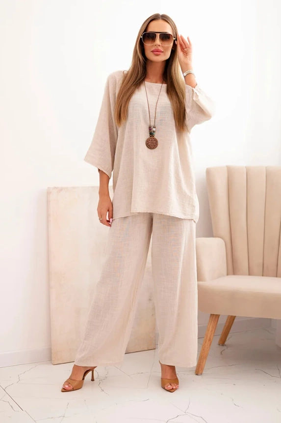 Women's set made of viscose blouse with necklace and trousers beige