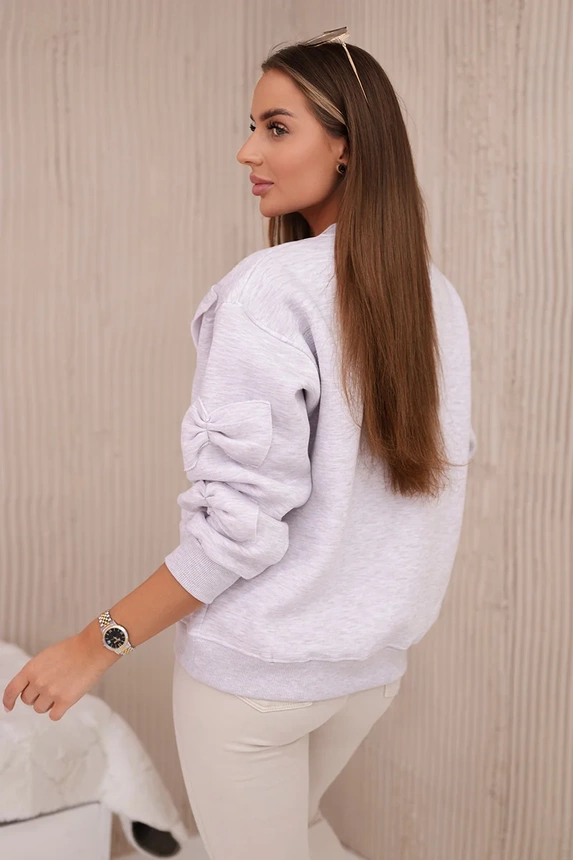 Insulated sweatshirt with welt and decorative bows beige melange