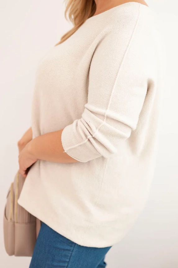 Plus size women's sweater with a boat neckline beige