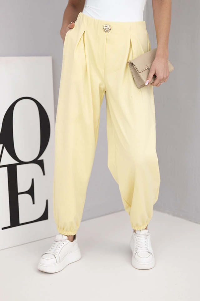 Women's cotton high-waisted pants with decorative button yellow