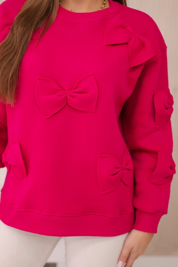 Isoliertes Sweatshirt mit Rahmen und Zierschleifen Fuchsia