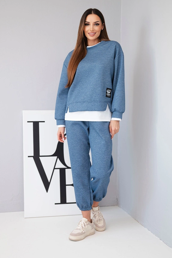 Women's set with a loose sweatshirt and sweatpants denim melange