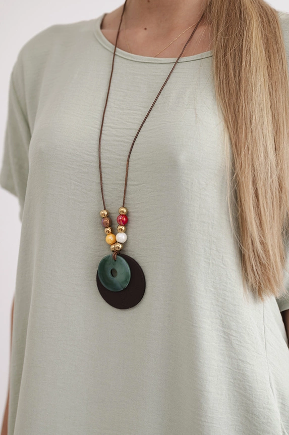 Dress with pockets and a pendant dark mint