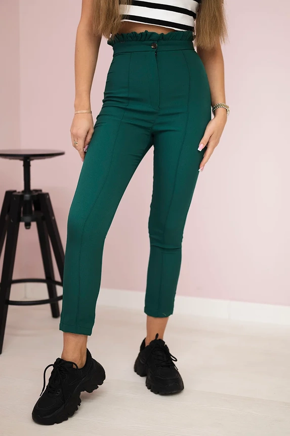 Creased trousers dark green