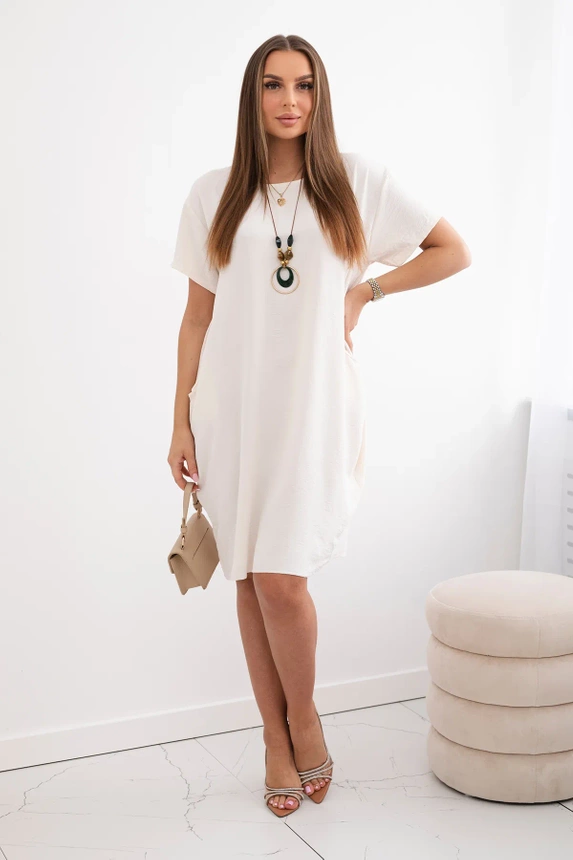 Kleid mit Taschen und Anhänger hellbeige