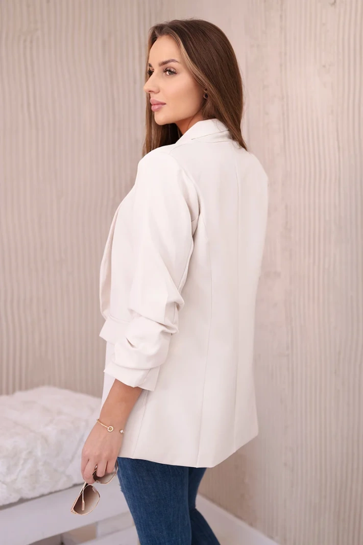 Elegantná bunda s chlopňami svetlo béžová