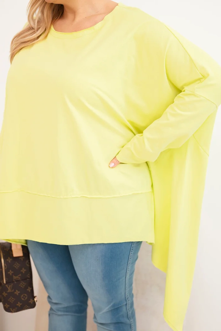 Plus Size women's tunic made of cotton with an asymmetrical hem light pistachio
