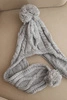 Women's winter wool hat with pom-poms and extended sides K448 gray