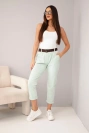 Women's cotton trousers with a belt and rolled-up leg dark mint