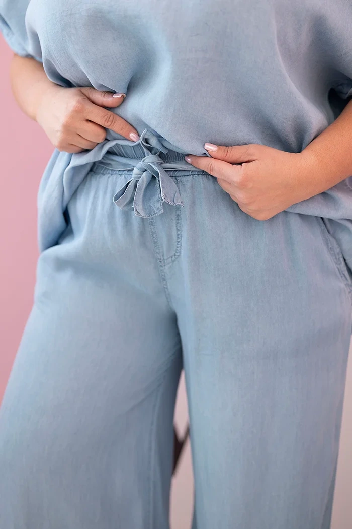 Plus Size women's set made of Tencel blouse and tie-waist pants light denim