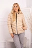 Quilted winter jacket with a hood beige