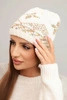 Women's winter hat made of wool with a colorful pattern K478 ecru