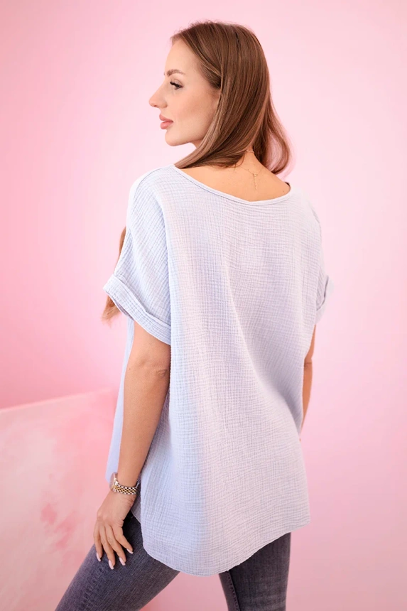 Muslin blouse with a necklace grey