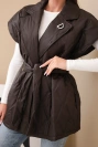 Women's quilted vest with a belt and wide collar brown
