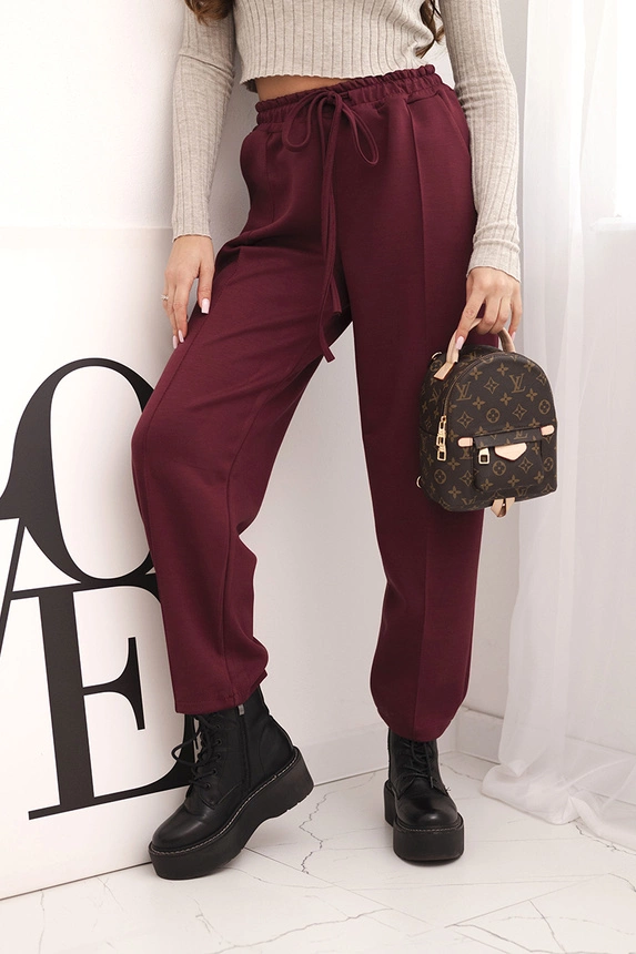 Elegant women's high-waisted trousers with a tie at the waist burgundy