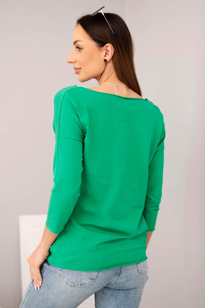 Women's blouse with a boat neckline green