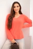 Women's sweater made of soft knit with a V-neck coral