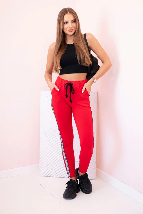 Women's sweatpants with side stripes and drawstring waist red