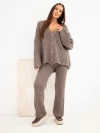 A women's knitted set with a cardigan and wide trousers fango
