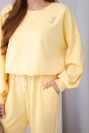 Women's set butter sweatshirt with a brooch and straight-leg pants lemon