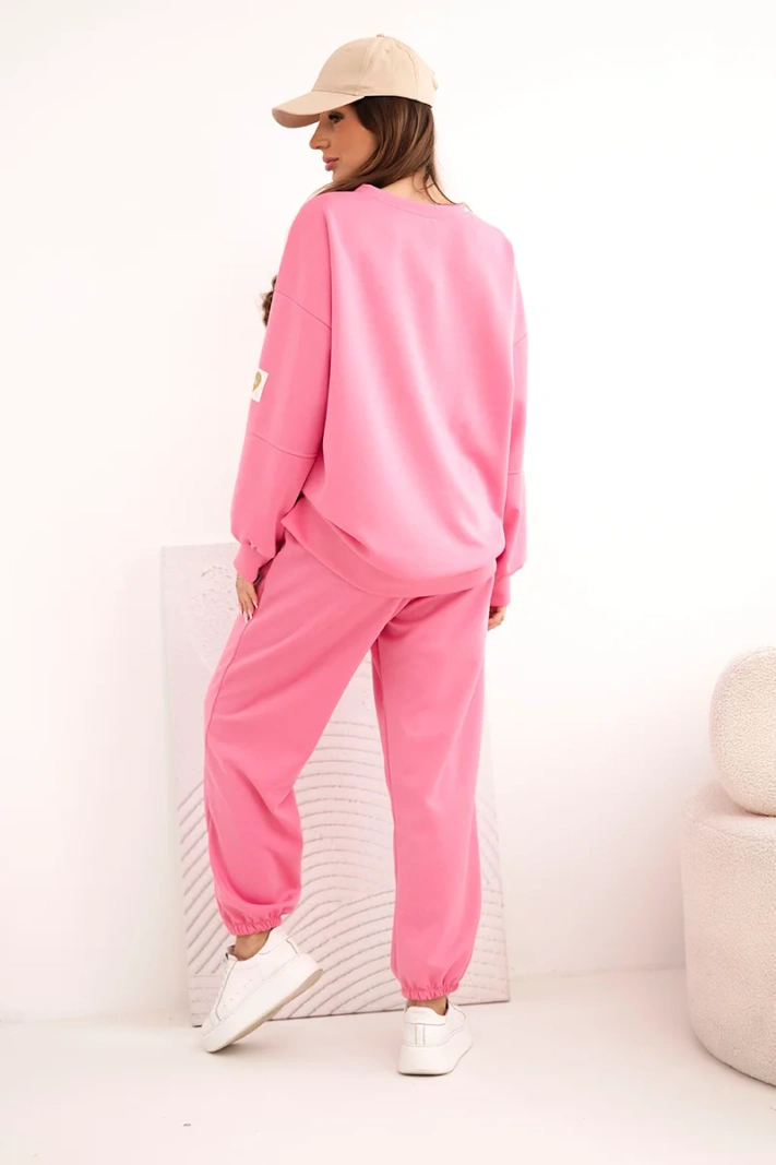 Buttery-soft women's set with a loose sweatshirt and pants with LOVE lettering pink
