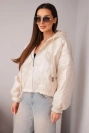 Women's quilted jacket with a hood and decorative floral embossing beige