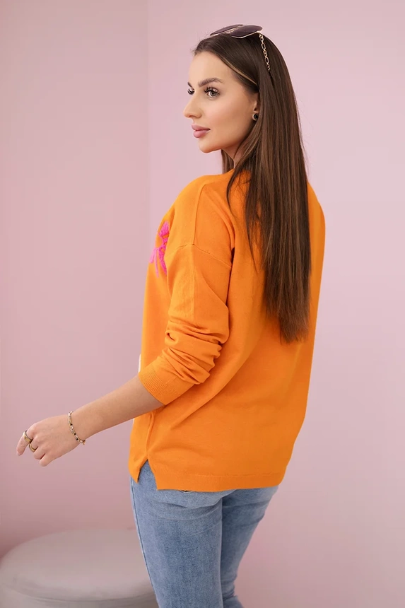 Sweater blouse with a floral pattern orange