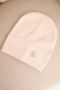 Women's ribbed cap made of modal and viscose with a decorative button beige