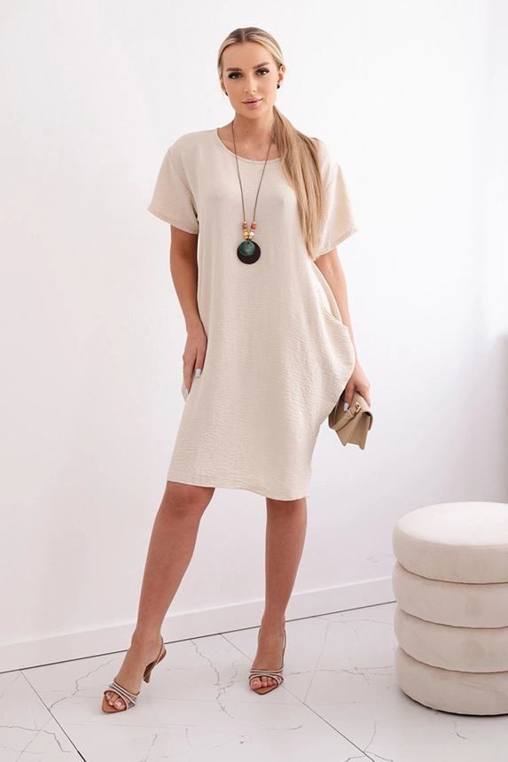 Dress with pockets and pendant dark beige
