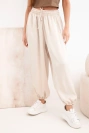 Women's wide trousers with elastic waistband and Aladdin-style drawstring beige