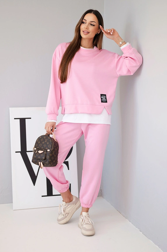 Women's set with a loose sweatshirt and joggers light pink