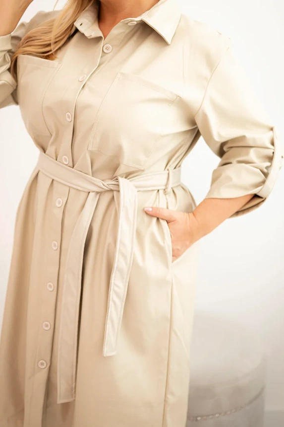 Plus Size women's dress made of eco-leather with a belt and collar beige