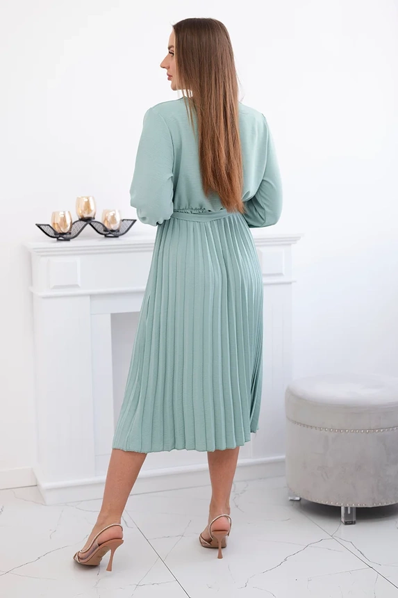 Dress tied with a pleated hem dark mint