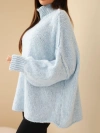 Women's oversized wool-blend sweater with a turtleneck and wide sleeves blue