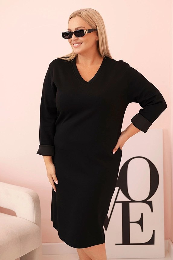 Plus Size women's dress in butter color with a V-neck and sleeves black